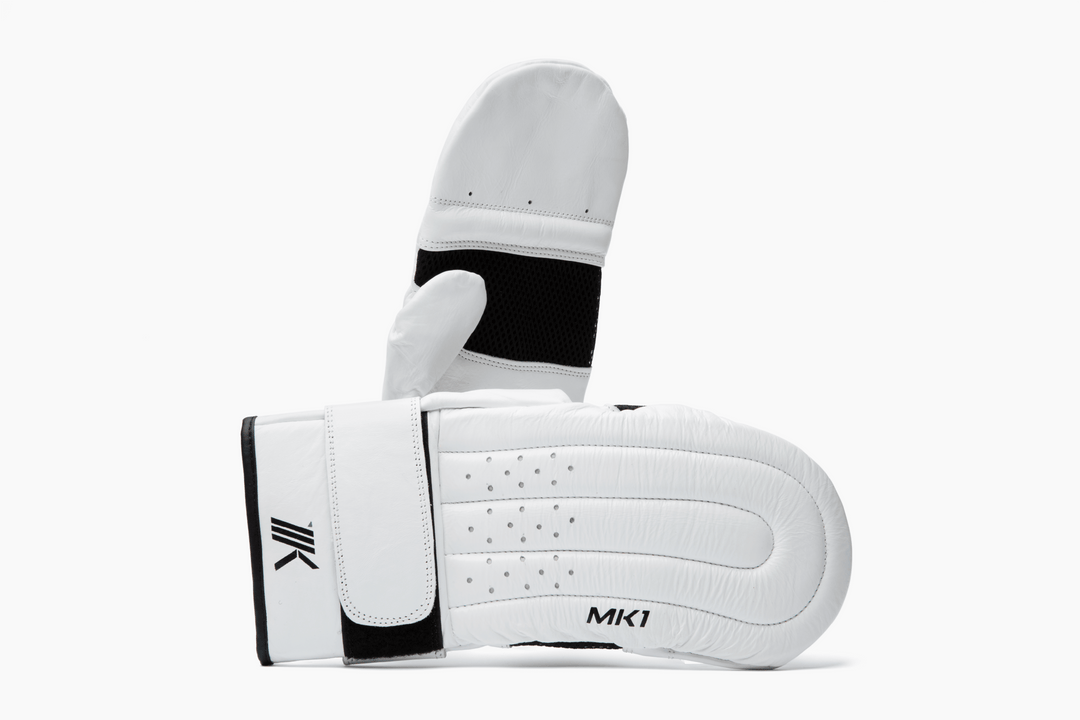 White leather boxing bag mitts.