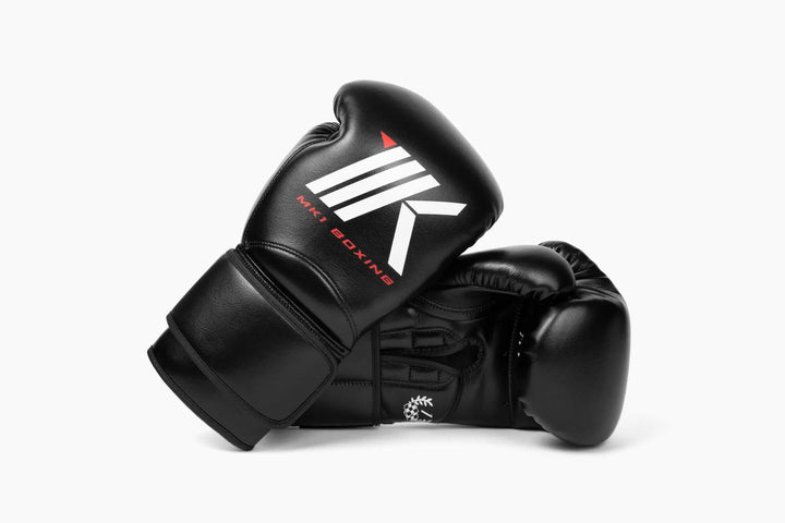 MK1's Black Mark 1 Boxing Training Gloves with a strap closure. 