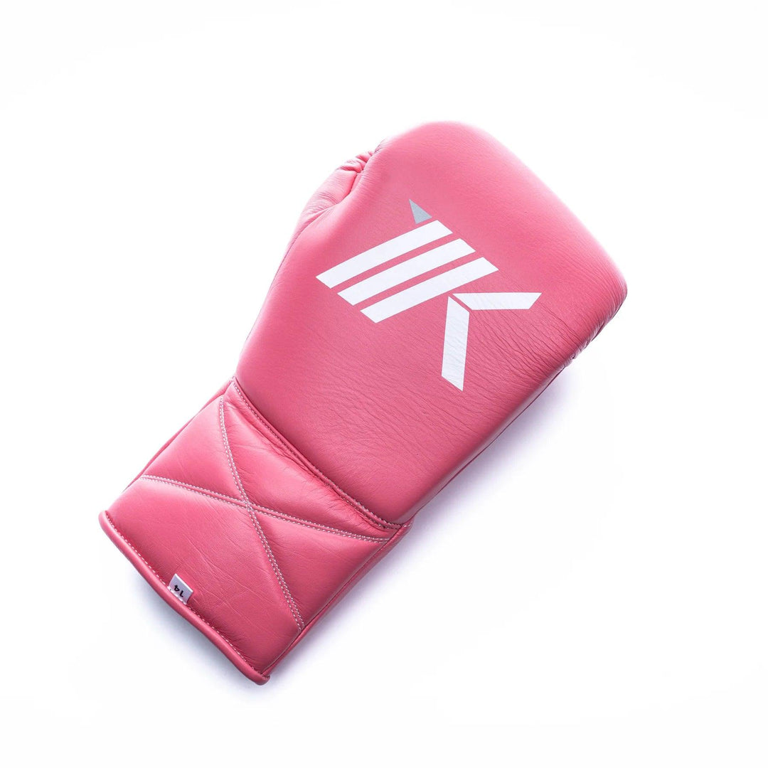 Pink lace-up boxing gloves for training, sparring, bag work, and mitt work handcrafted in genuine leather.  